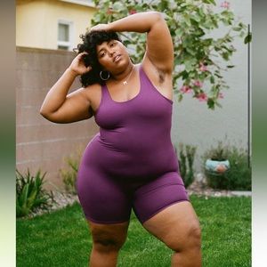 Girlfriend collective bike unitard in S/ Plum